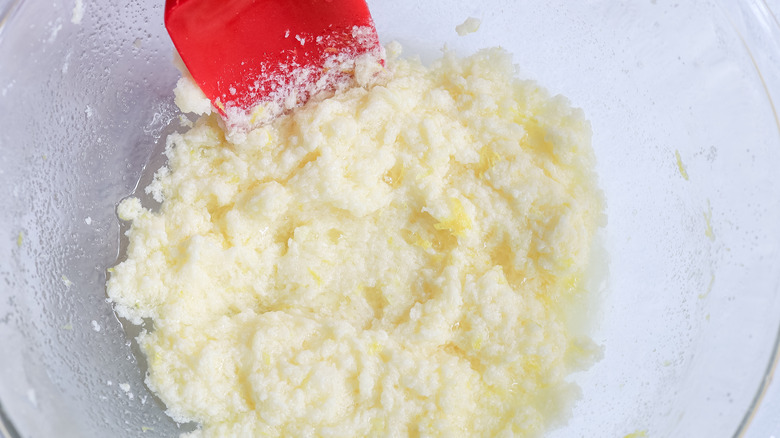 combining cookie ingredients in bowl