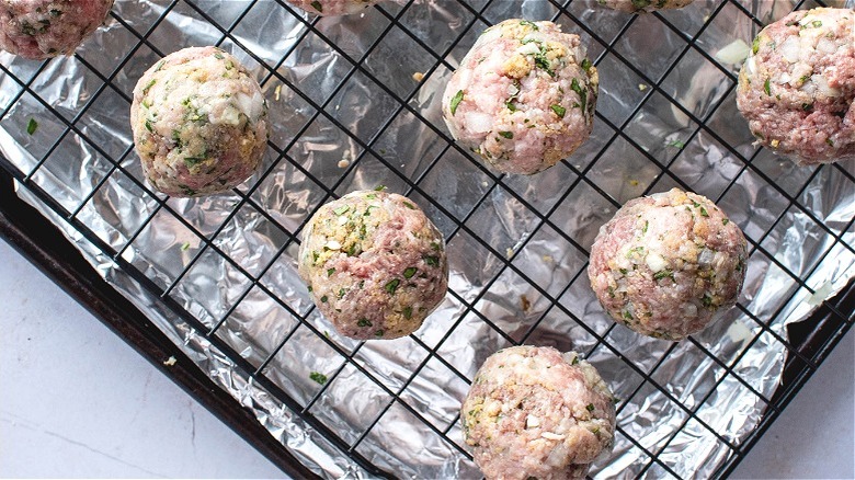 rolled meatballs on sheet tray
