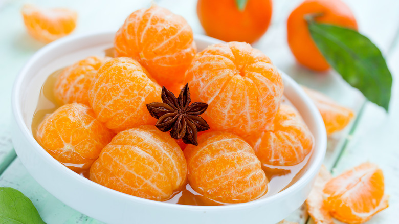 peeled clementines with cinnamon