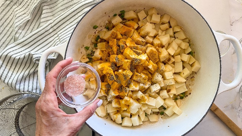 potatoes in pot with indian spices