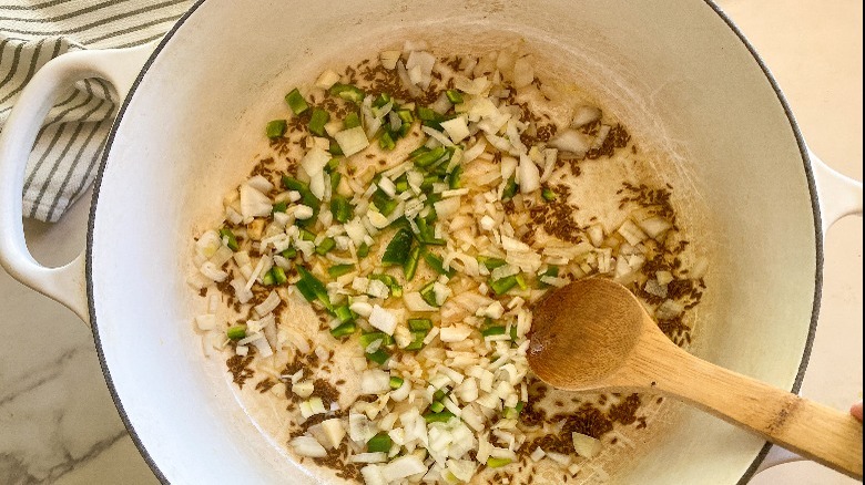 big pot with ingredients sauteeing