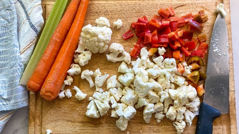 chopped vegetables on board