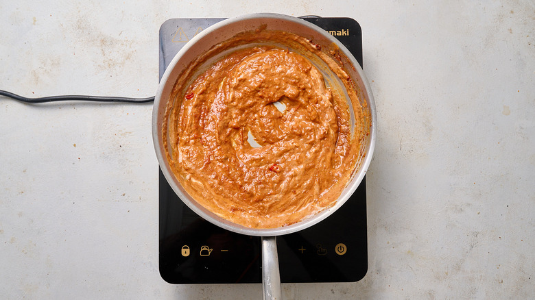 simmering curry in skillet