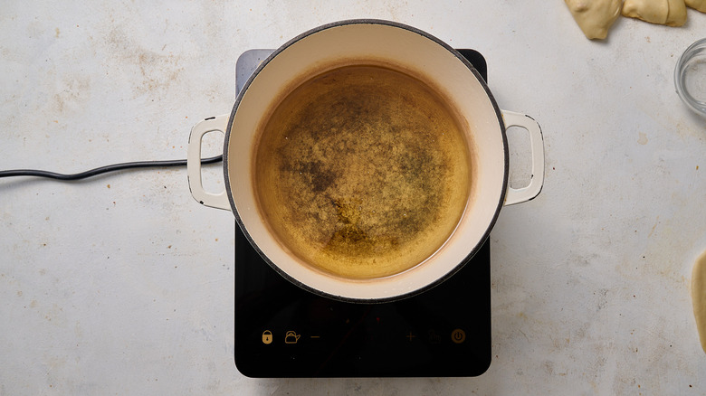 heating oil in pot