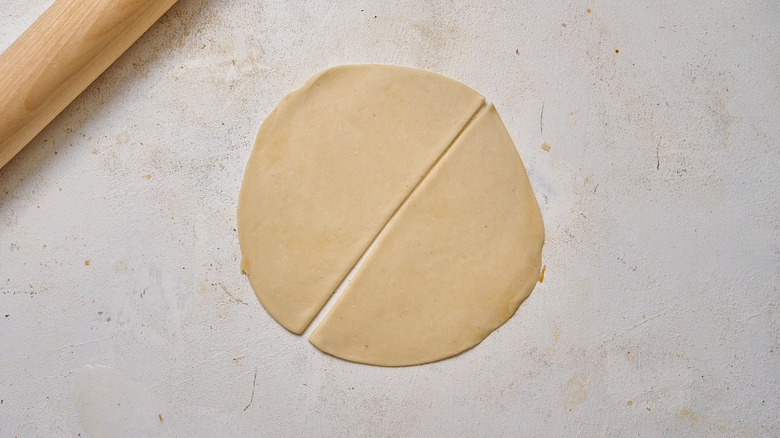 dough divided into half moons