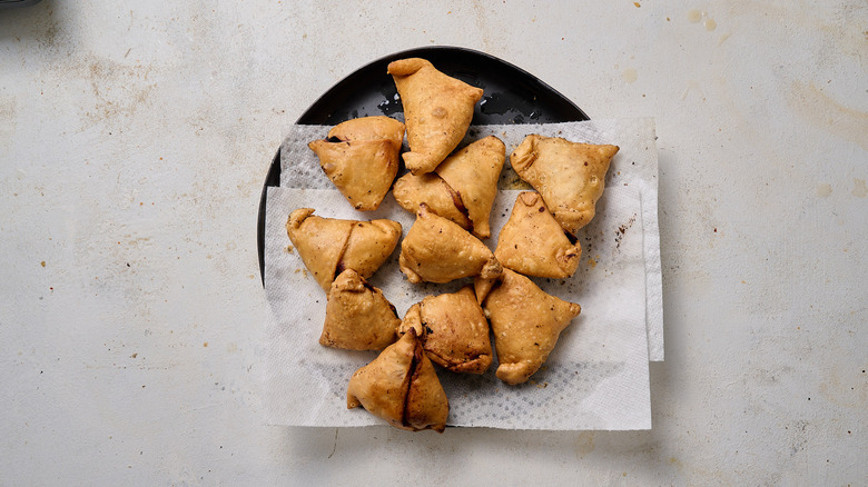 fried samosas on plate