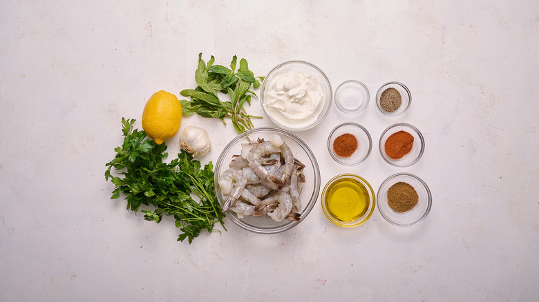 shrimp and yogurt sauce ingredients on a table