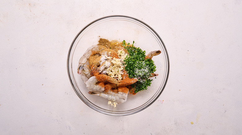 shrimp and marinade in bowl