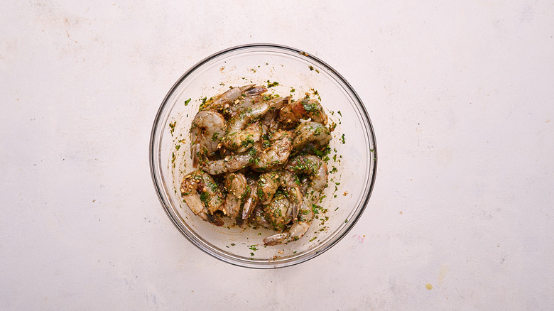 marinating shrimp in bowl