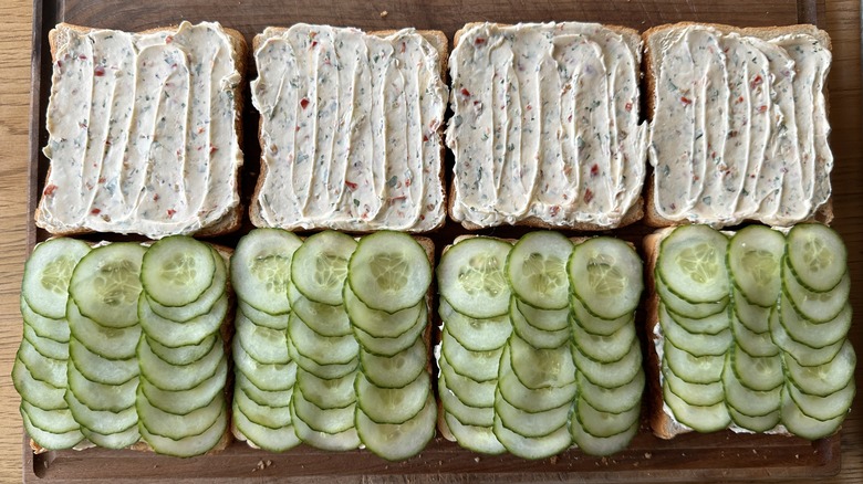 cucumbers and cream cheese on bread