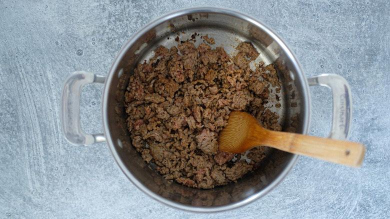 ground meat in metal pan