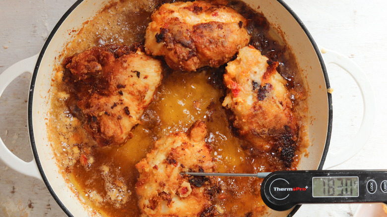 fried chicken with meat thermometer