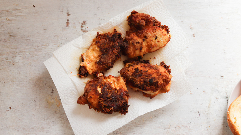 fried chicken on paper towels