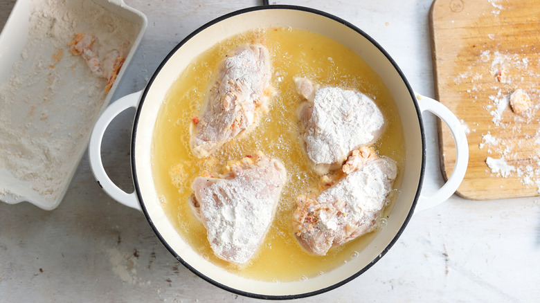 chicken frying in skillet