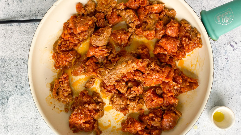 sautéing chorizo in skillet