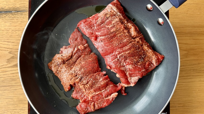 steak in frying pan