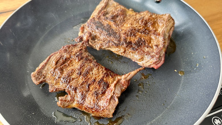 steak in frying pan