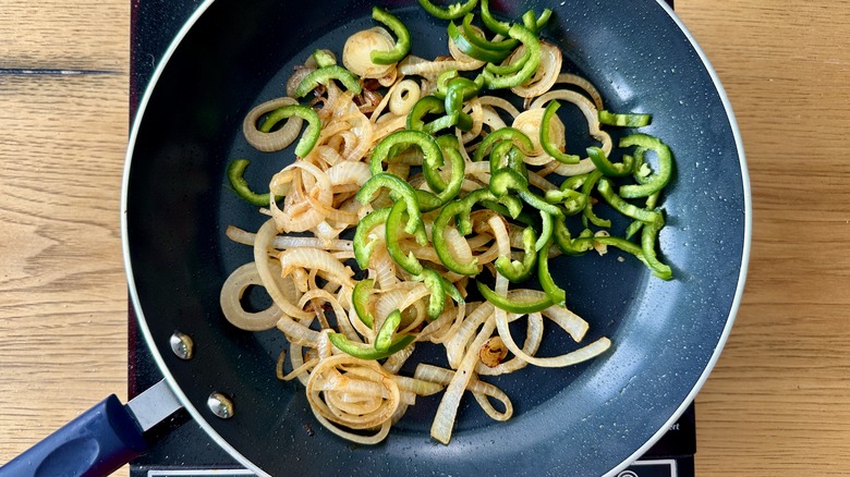 onions and jalapeños in pan