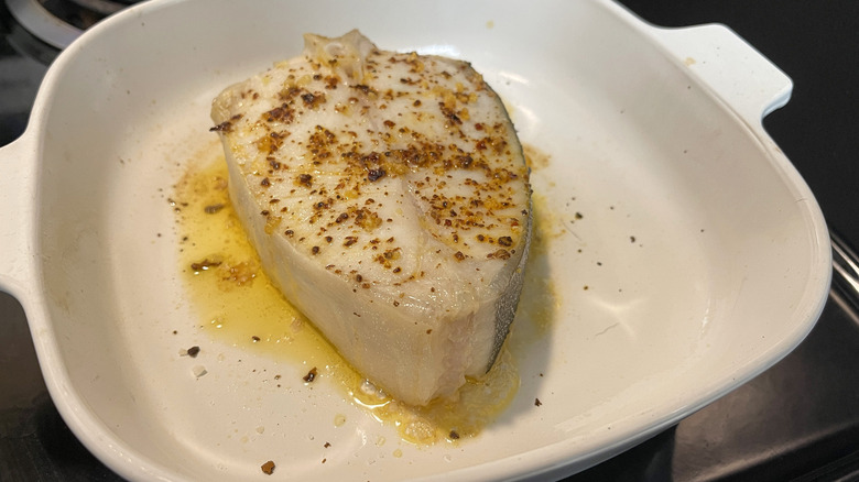 cooked halibut fillet in pan