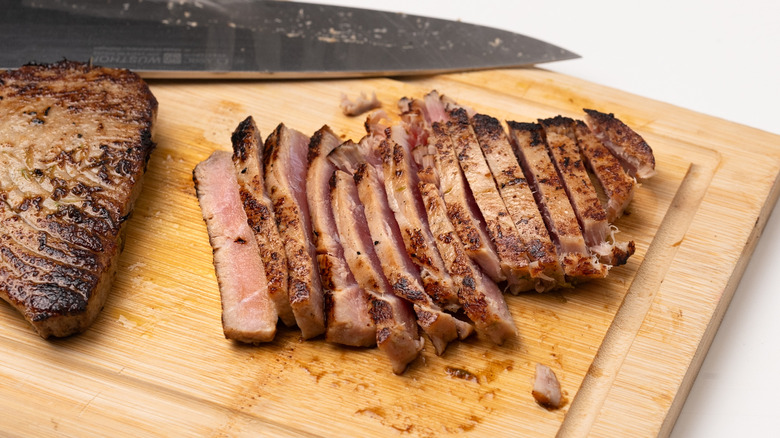 sliced tuna steak on cutting board