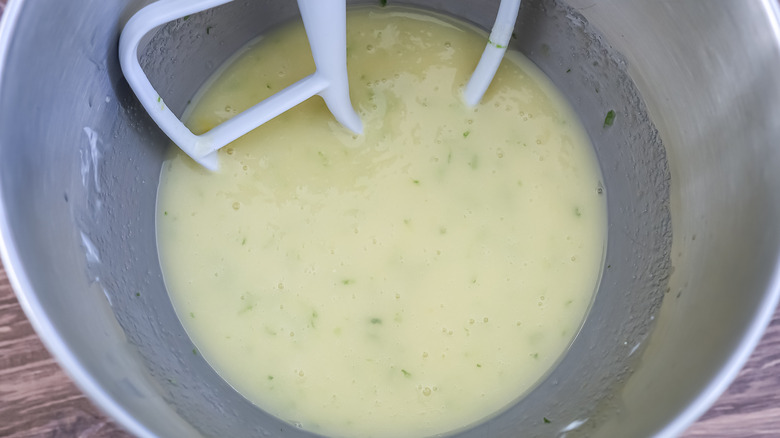 bowl of a stand mixer with wet ingredients