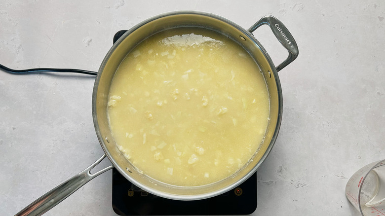 chicken broth in skillet