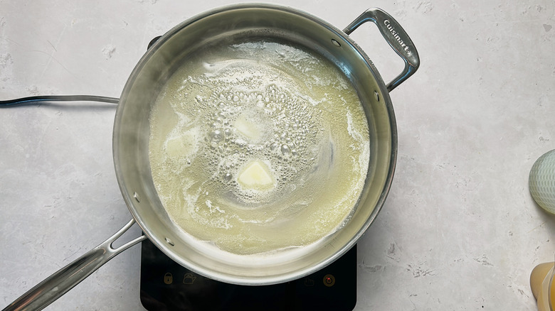 melting butter in a skillet