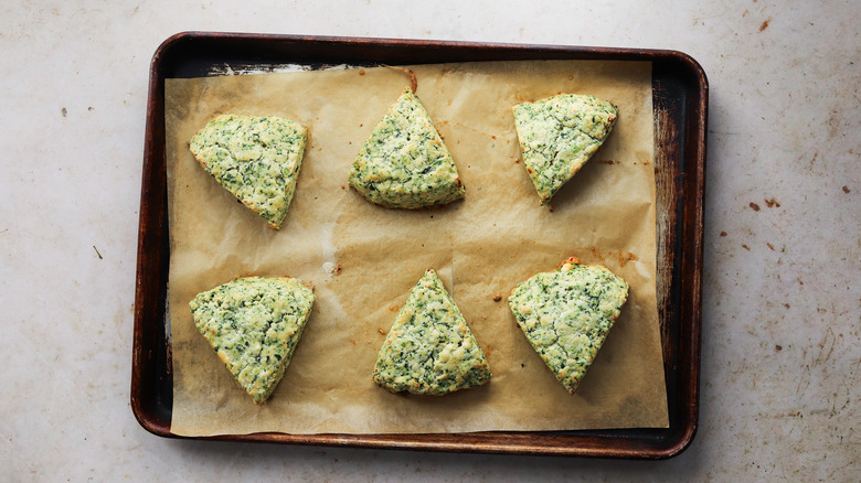 Baked spinach scones on sheet tray