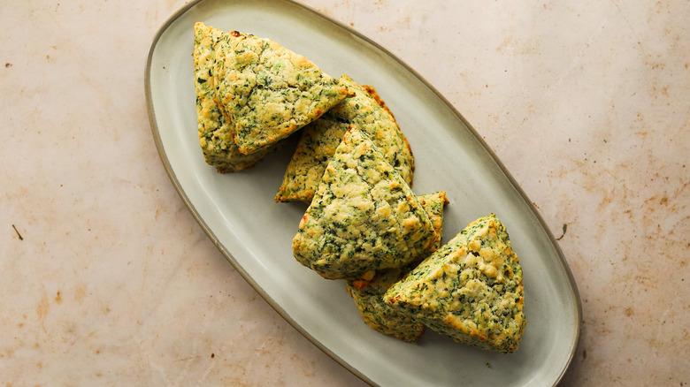 spinach scones piled on plate