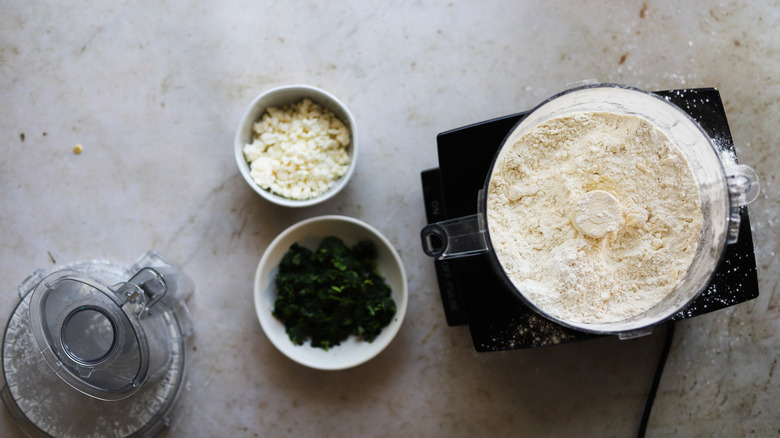 Adding spinach and feta to dough