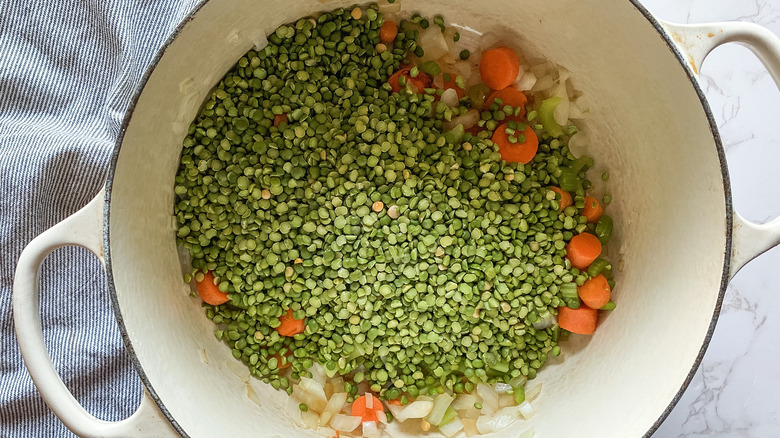 peas and mirepoix in pot