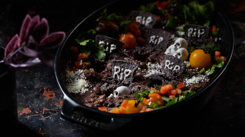 graveyard bean dip on table