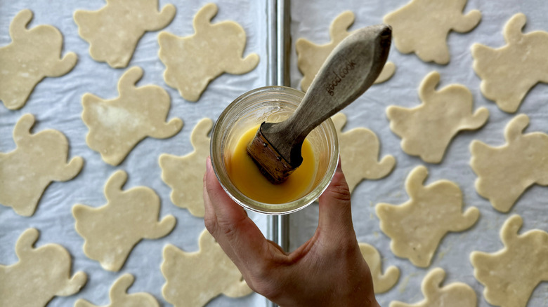 Egg wash in jar with brush