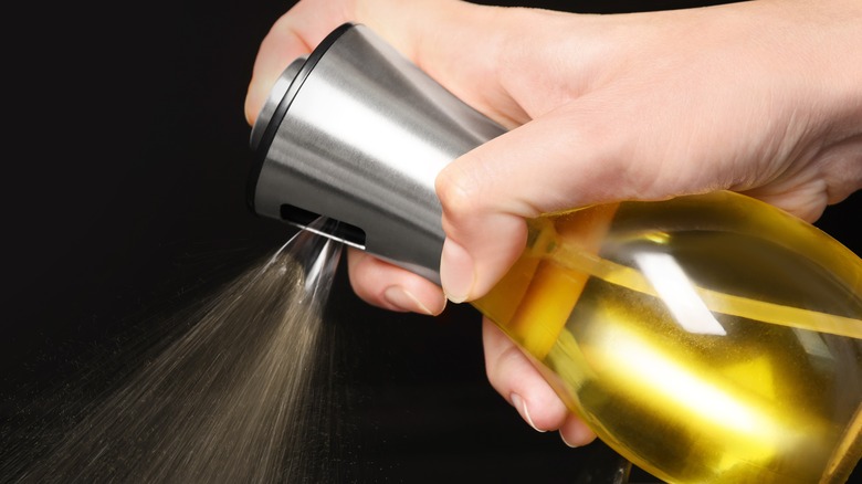 spraying cooking oil