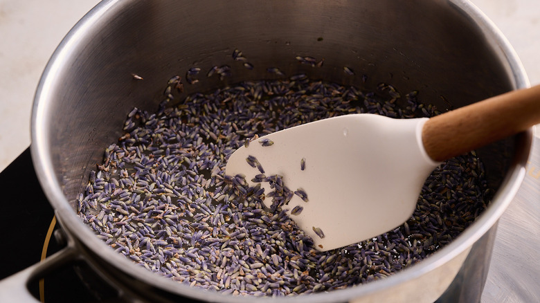 stirring simple syrup in a pot