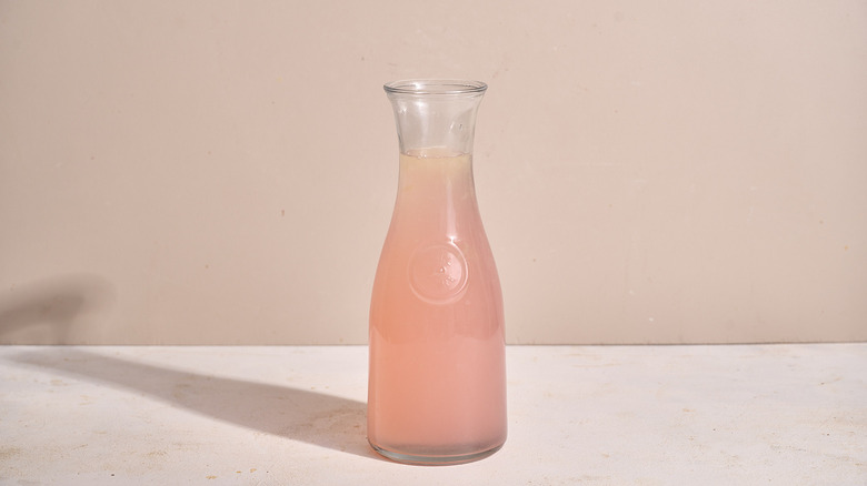 pitcher of lavender lemonade on table
