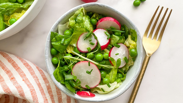 bowl of salad with fork