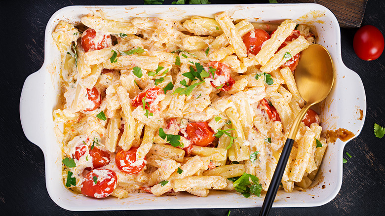 tomato feta pasta in a baking dish