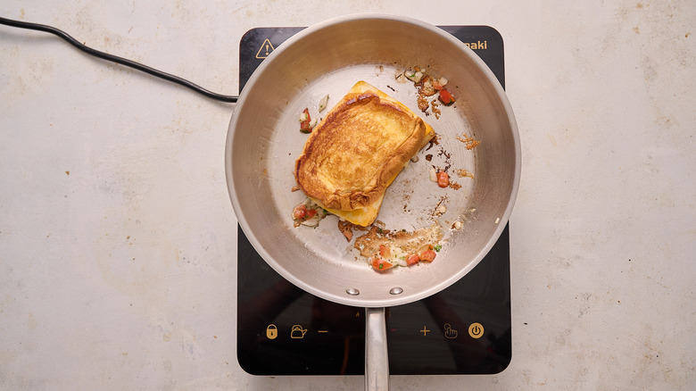 toasted grilled cheese in skillet