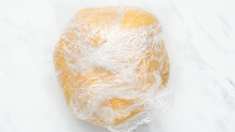 plastic-wrapped ball of marzipan