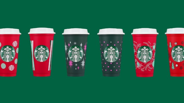 https://www.tastingtable.com/img/gallery/starbucks-2022-holiday-cup-lineup-features-some-eye-catching-designs/intro-1666121489.jpg