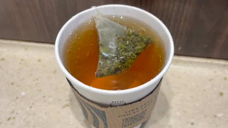 Overview of a steeping cup of Starbucks' Mint Majesty Tea