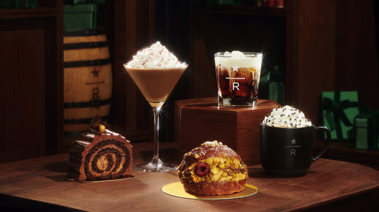 New Starbucks Roastery drinks and food items on wood board