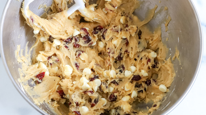 cranberry bliss cheesecake bar batter in a bowl