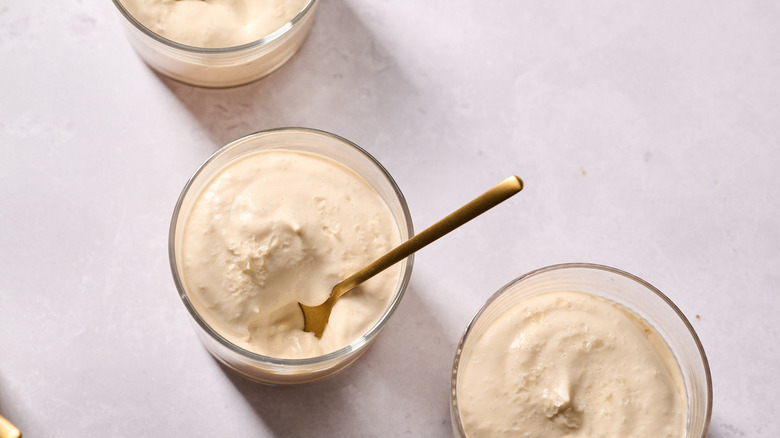 cups of panna cotta on table