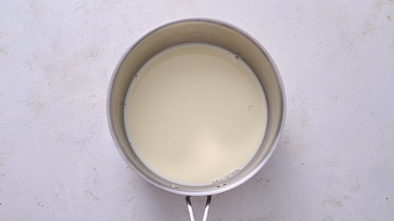 cream and sugar in saucepan