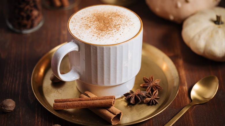 Fall-themed drink on platter 