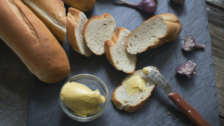 Garlic bread ingredients on table