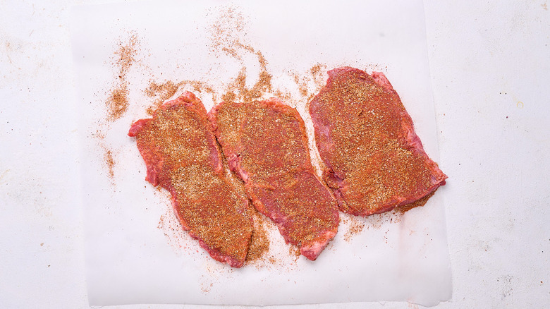 steak rubbed with chili powder