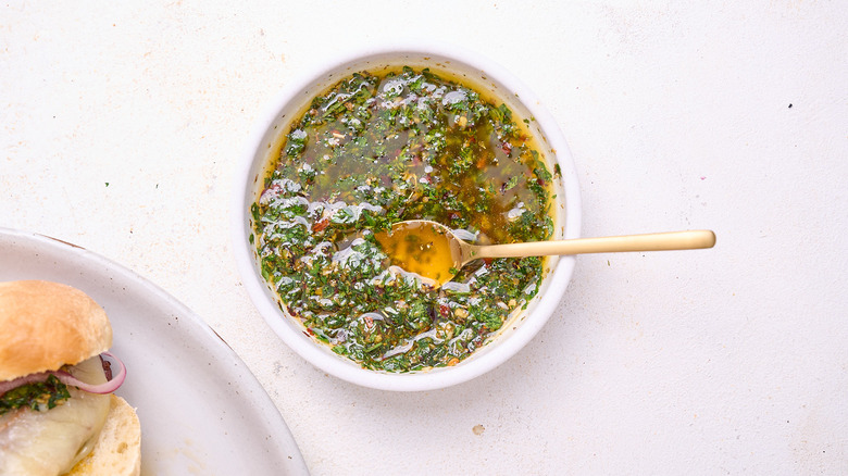 bowl of chimichurri on table